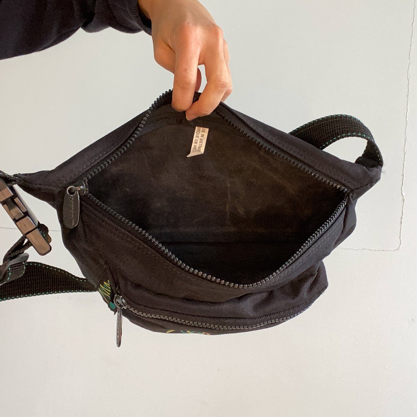 Delsey black bum bag.