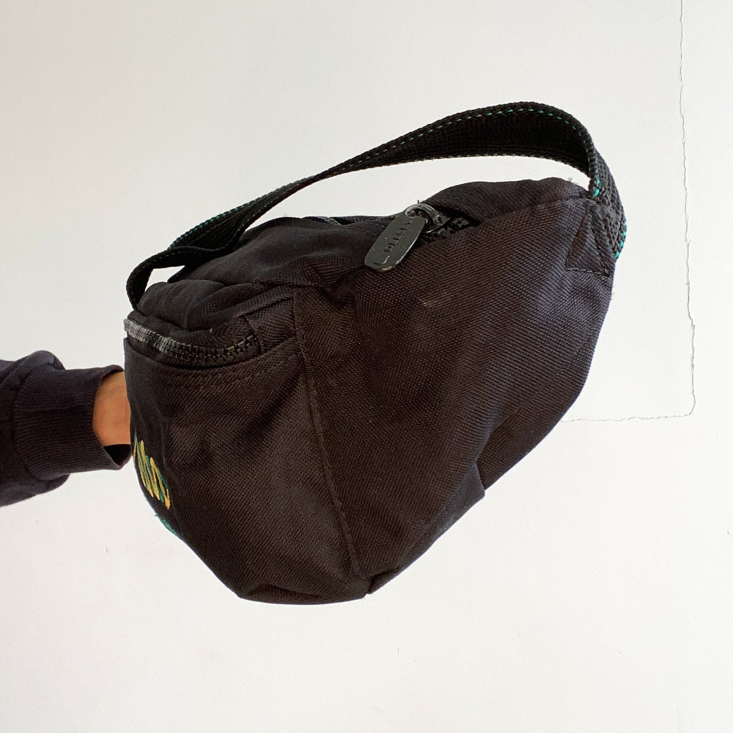 Delsey black bum bag.